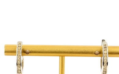 A pair of 18ct white gold diamond hoop earrings, L. 2cm.