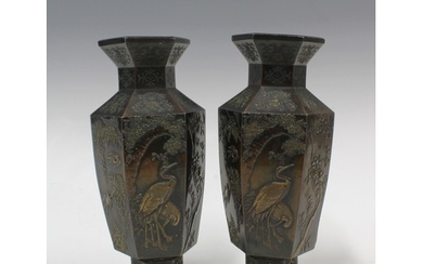 A pair of Japanese bronze patinated metal vases, hexagonal f...