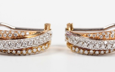 A pair of Leo Pizzo two colour gold and diamond half hoop earrings in a twist design, pavé set