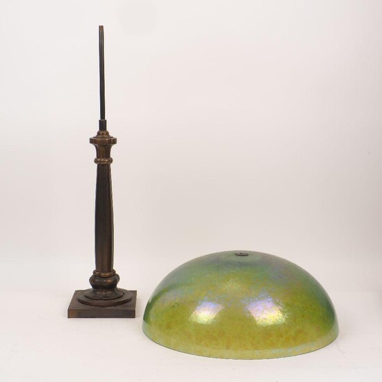 A patinated bronze table lamp, 20th century, with an opalescent glass shade, the shaped cluster column stem on a circular base and square stepped plinth, 60cm high