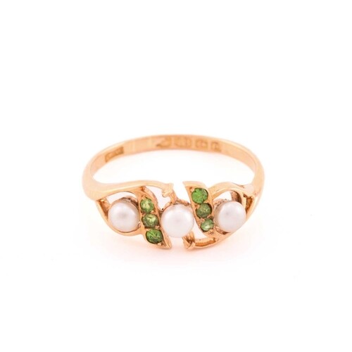A pearl and demantoid garnet dress ring in 18ct gold, compri...