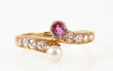 A pearl and diamond crossover ring.