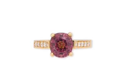 A pink spinel, diamond and eighteen karat gold ring