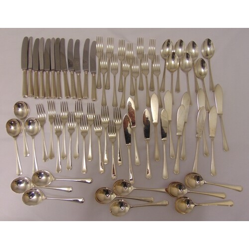 A quantity of silver plated flatware to include knives, fork...