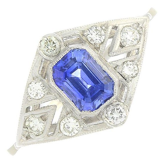 A sapphire and diamond dress ring.Sapphire weight