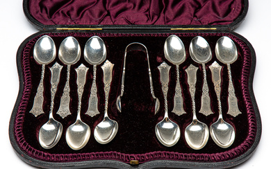 A set of twelve hallmarked sterling silver teaspoons and sugar...