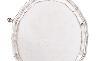 A silver shaped circular salver by Charles Stuart Harris