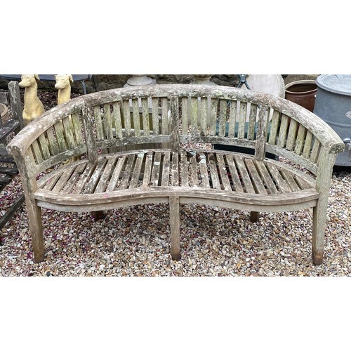 A teak garden bench, 161 cm wide