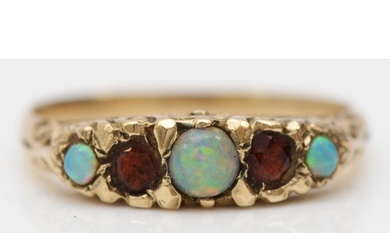 A vintage unmarked gold opal and garnet five stone ring, car...