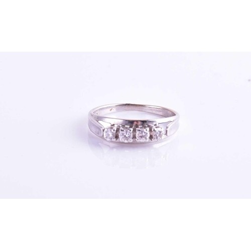 A white metal and diamond ring, set with four round-cut diam...