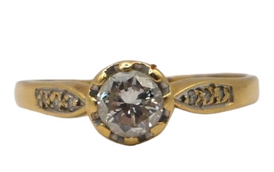 AN 18CT GOLD AND DIAMOND SOLITAIRE RING Having brilliant...