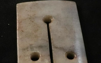 AN ANTIQUE JADE PENDANT WITH THREE HOLES