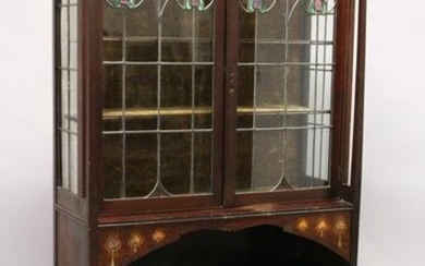 AN ART NOUVEAU MAHOGANY INLAID CHINA CABINET with a