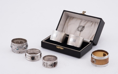 AN ARTS AND CRAFTS SILVER CYMRIC NAPKIN RING, LIBERTY & CO.