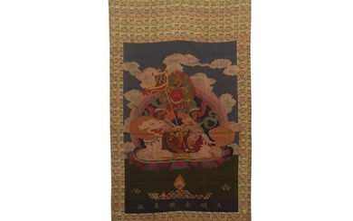 AN EMBROIDERED KESI APPLIQUE OF BUDDHA