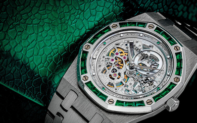AUDEMARS PIGUET. A STUNNING AND UNIQUE PLATINUM AND EMERALD-SET SKELETONISED WRISTWATCH WITH BRACELET