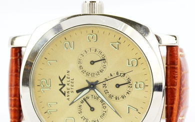 An Anne Klein steel chronographic (no. 6P29, 10/5273) wristwatch on a brown embossed leather strap.