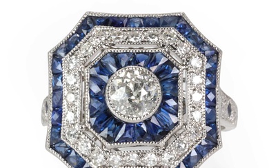 An Art Deco style sapphire and diamond target cluster ring