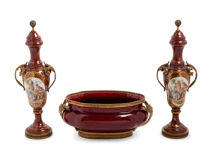 An Assembled French Gilt Metal Mounted Porcelain and Pottery Garniture