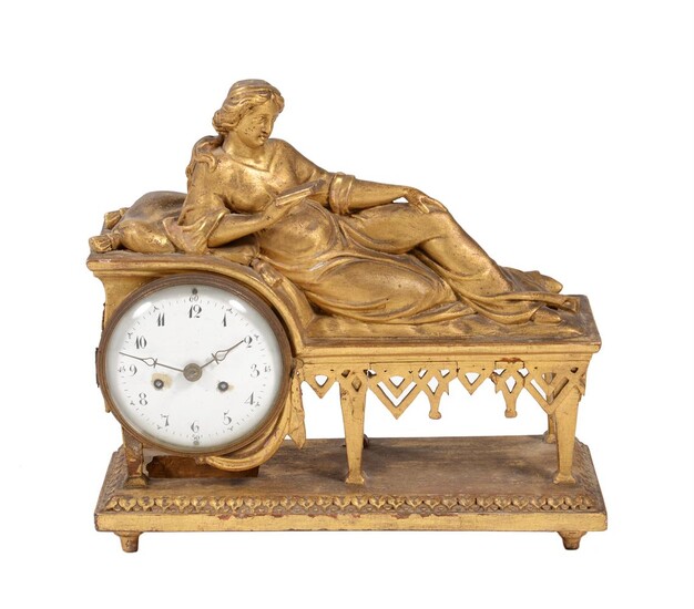 An Austrian late Biedermeier carved giltwood figural mantel clock