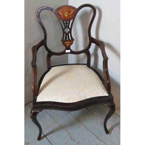 An Edwardian mahogany Sheraton revival inlaid elbow chair, s...