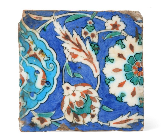 An Isnik Pottery Tile, circa 1580, typically painted in red,...