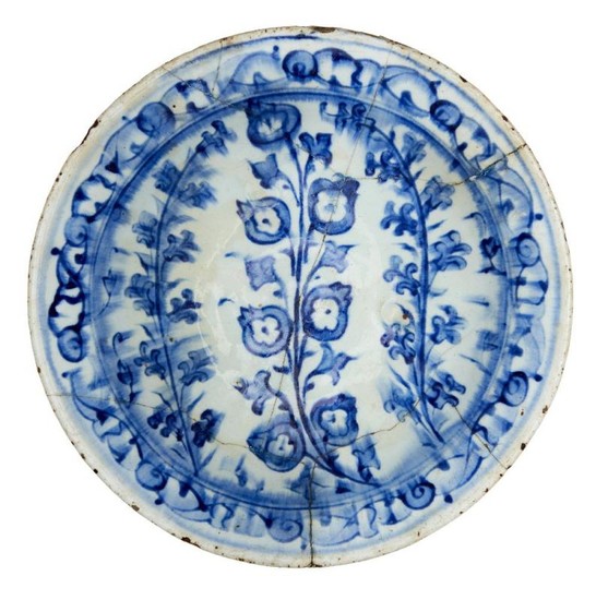 An Iznik blue and white pottery bowl,...