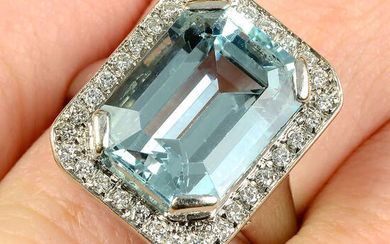 An aquamarine and brilliant-cut diamond cluster dress ring.