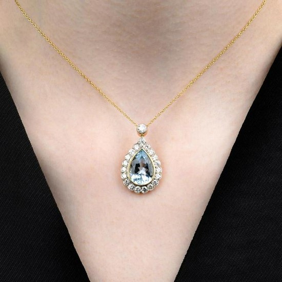 An aquamarine and diamond pendant, on chain.Aquamarine