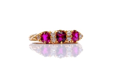 An early 20th Century 18ct hallmarked ruby and diamond seven...