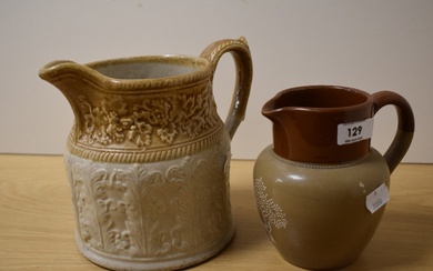 An early 20th Century Cadbury stoneware jug, measuring 15cm high, and another relief moulded