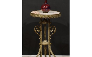 An early 20th century French brass and onyx tripod guéridon ...