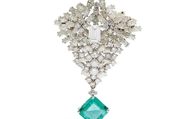 An emerald and diamond brooch