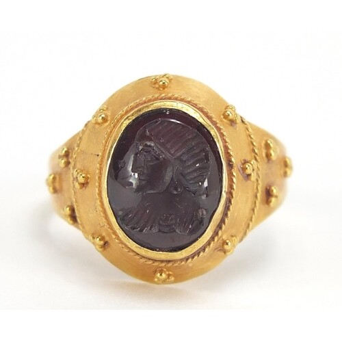 Antique unmarked gold intaglio silver ring carved with a gla...