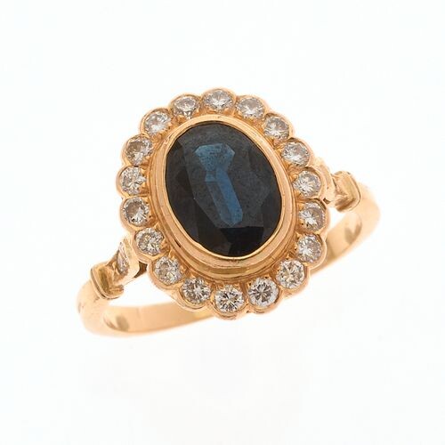 RING "Pompadour" in 750/°° yellow gold decorated in its center...
