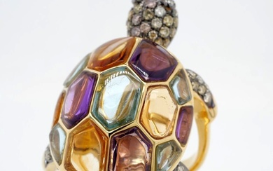 BAGUE "tortue" en or, pierres fines, diamants.