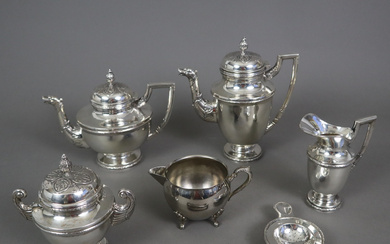 COFFEE/TEA CORE - 915 silver, Oriol, Spain, after 1934, empire shape with relief decoration, geometric handles, mythical head spouts and pine lid knobs.