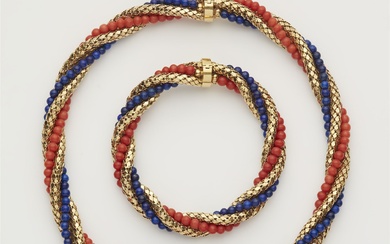 Collier et bracelet à cordon Or jaune de 18 ct. Composé d'une bande tubulaire en...