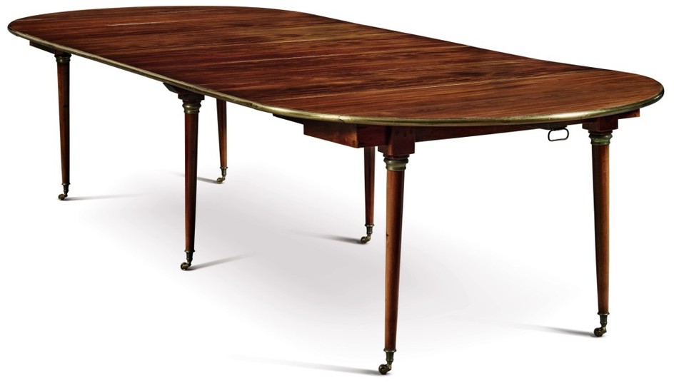 DIRECTOIRE BRASS-MOUNTED MAHOGANY OVAL DINING TABLE WITH LATER LEAVES, EARLY 19TH CENTURY
