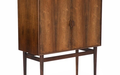 SOLD. Danish furniture design: Bar of rosewood, top with black formica. Front with two doors. Inside with grey lacquered shelves. – Bruun Rasmussen Auctioneers of Fine Art