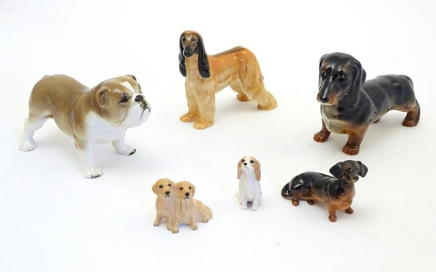 Five assorted Beswick dogs comprising Afghan Hound