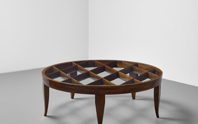 GIO PONTI (1891-1979) Exceptional Round Grid Coffee Tablecirca 1945-1948fruitwood, glassheight 17 3/4in (45cm); diameter 51 1/8in (130cm)