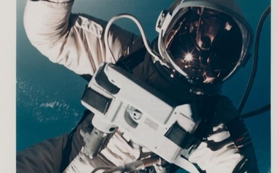 [Gemini IV] The first US spacewalk: extraordinary close-up of Ed White with...