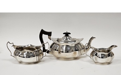 George V three-piece silver teaset comprising teapot, twin-h...
