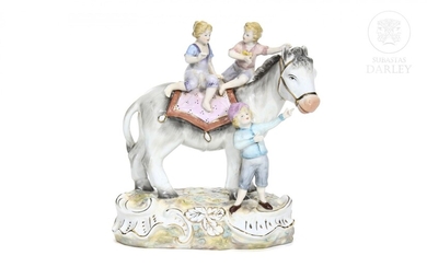 German porcelain figurine "Three children playing with a donkey", 20th century