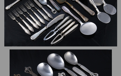 Hans Hansen et al. A collection of serving pieces with silver handles in various patterns (31)