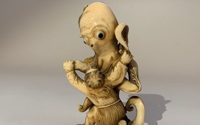 Ivory okimono of a man fighting an octopus - Ivory - Japan - 19th century