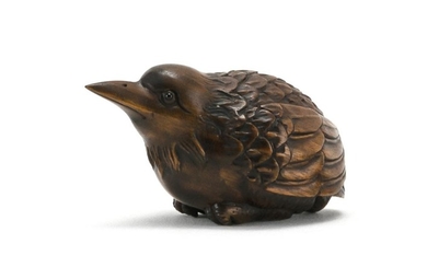 JAPANESE WOOD NETSUKE In the form of a sparrow. Signed on base. Length 2.5".