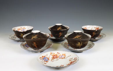 Japan, set of five lacquer-decorated porcelain cups, six saucers, and three covers, Meiji period (1868-1912)
