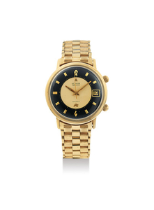 LeCoultre. A Rare Yellow Gold Centre Seconds Alarm Wristwatch with Date, Champagne and Black Dial